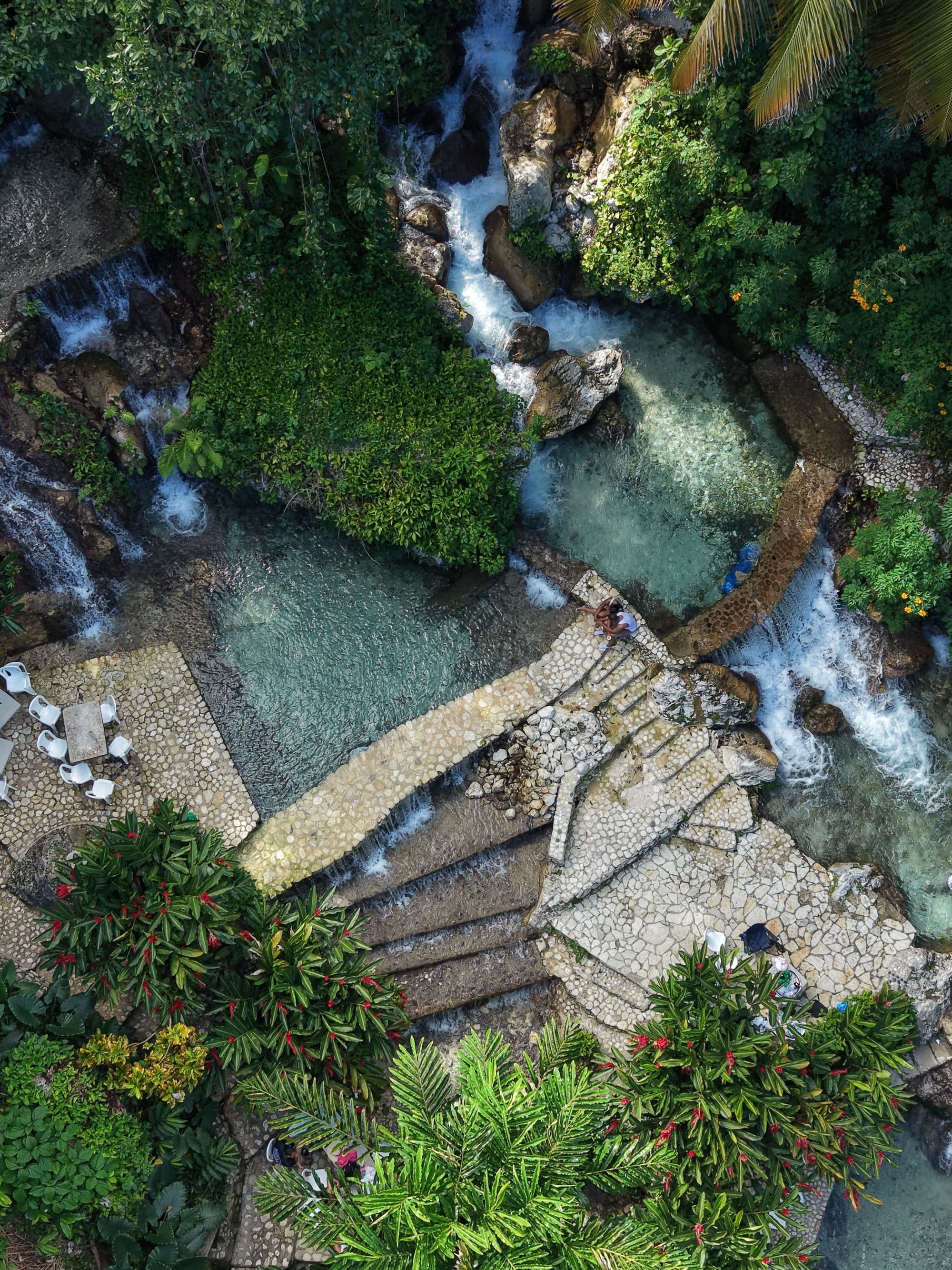 Tropical waterfall cascading into turquoise pools