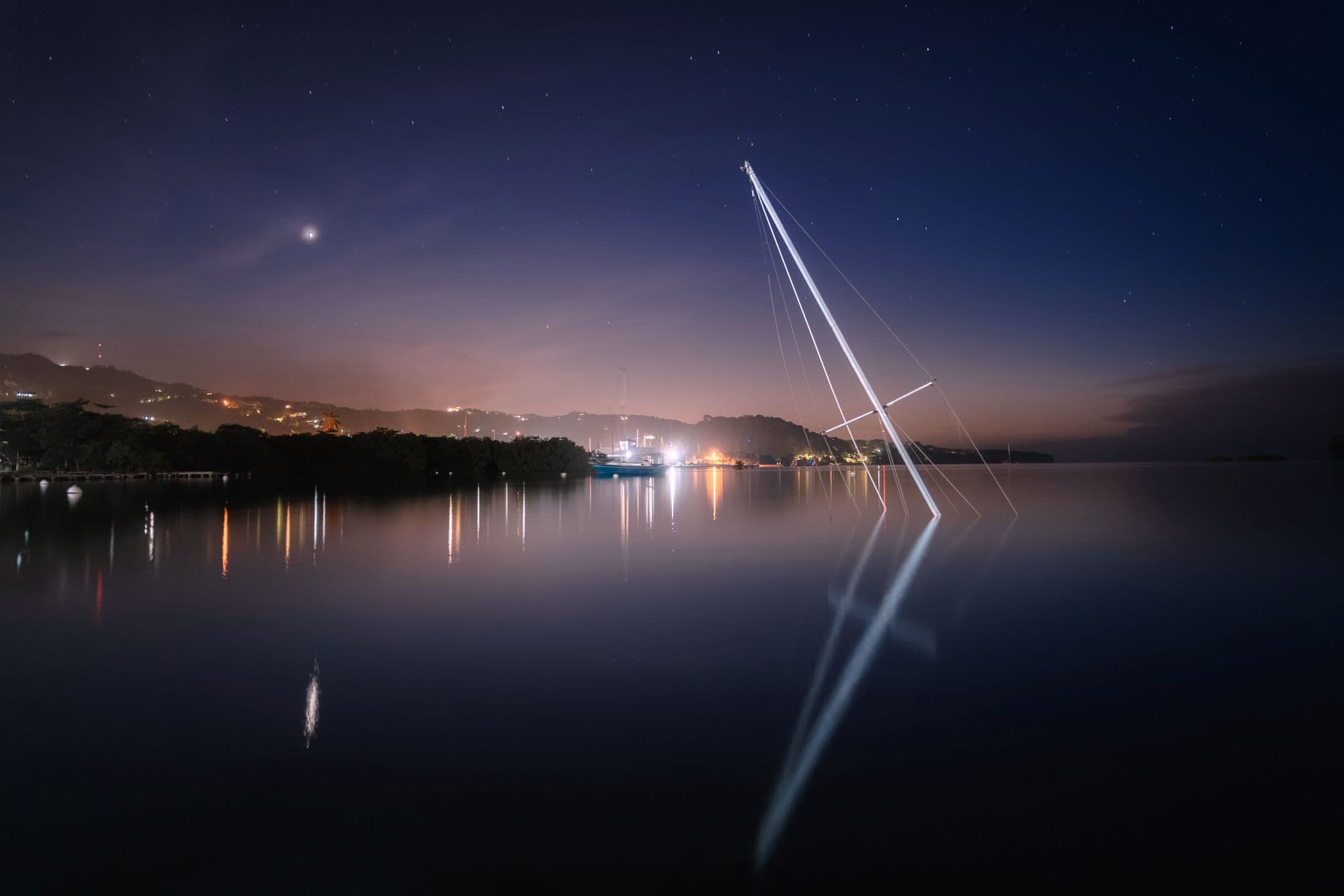Port Antonio harbour at night under a starry sky, Jamaica